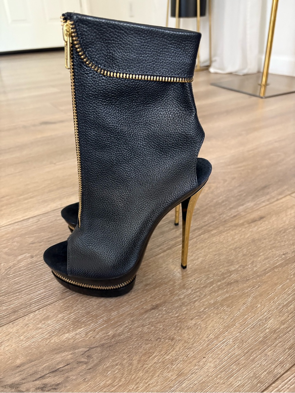 Black Peep-Toe High Heel Booties with Gold Zip Detail